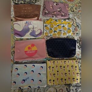 NEW Lot of 8 Ipsy bags all new, never used. Makeup Cosmetic GlamBags.